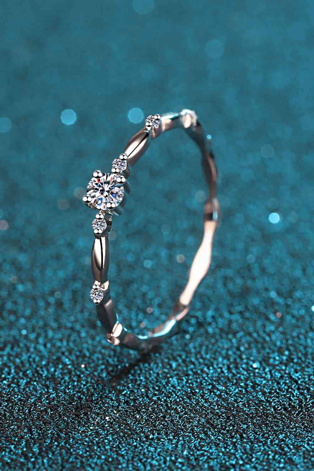 Moissanite Solitaire with Zircon Accents Stirling Silver Band