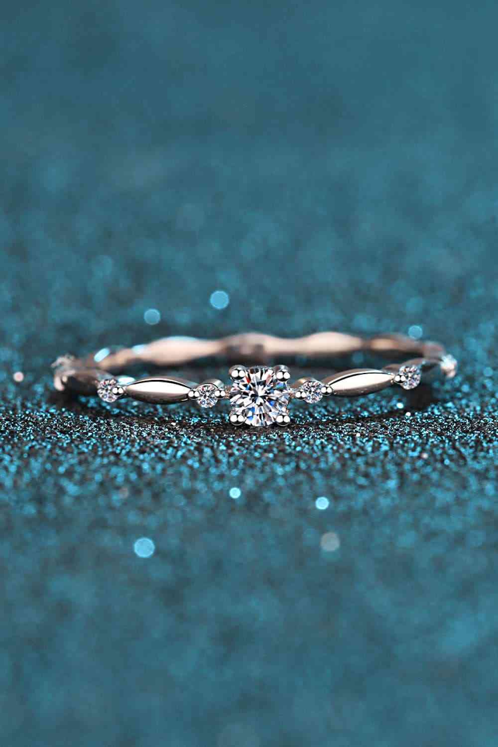 Moissanite Solitaire with Zircon Accents Stirling Silver Band