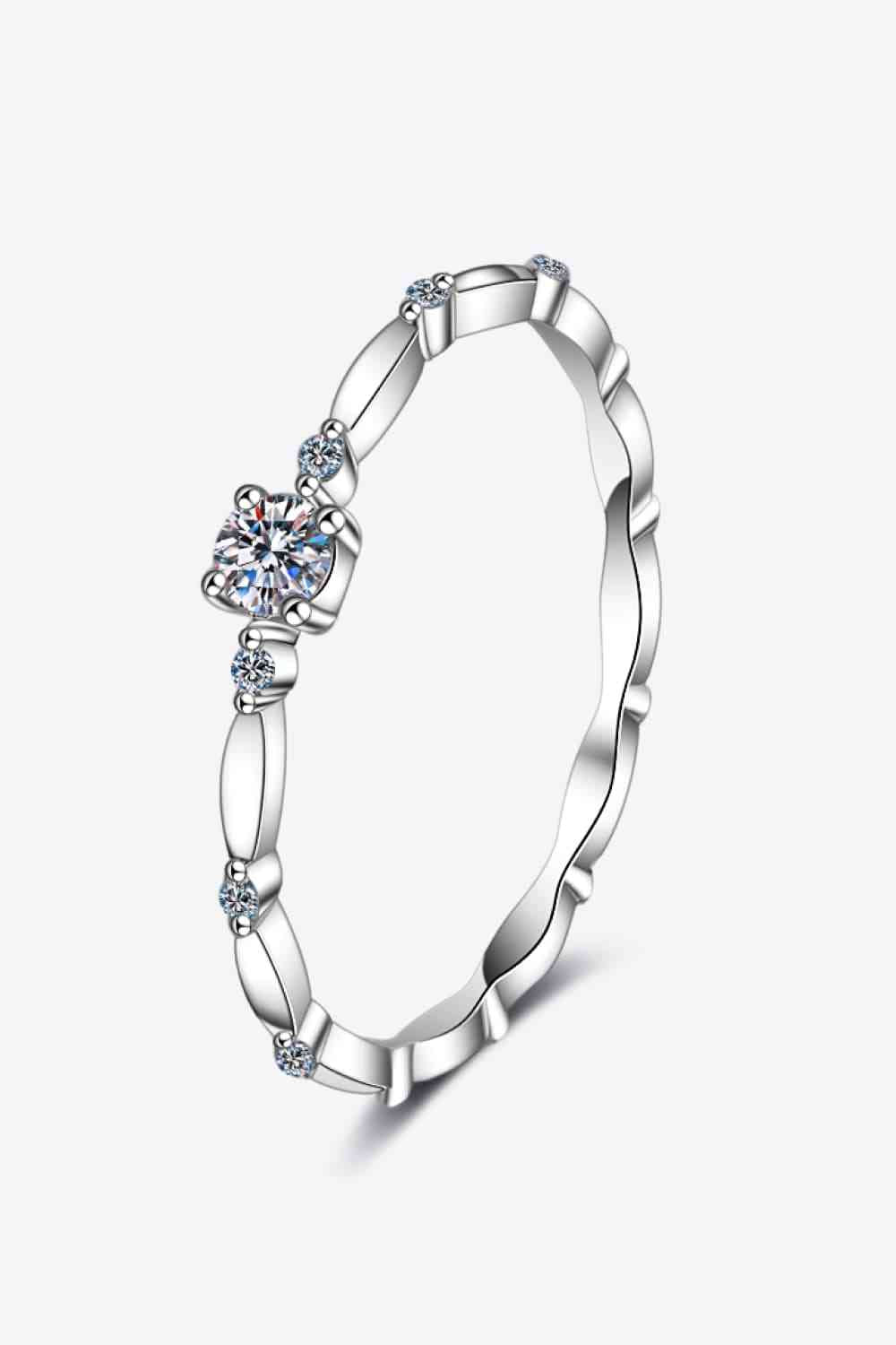 Moissanite Solitaire with Zircon Accents Stirling Silver Band