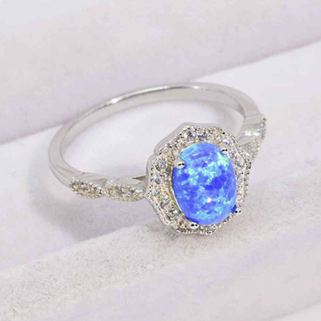 Blue Fire Opal Silver Halo Ring with Zircon Accents