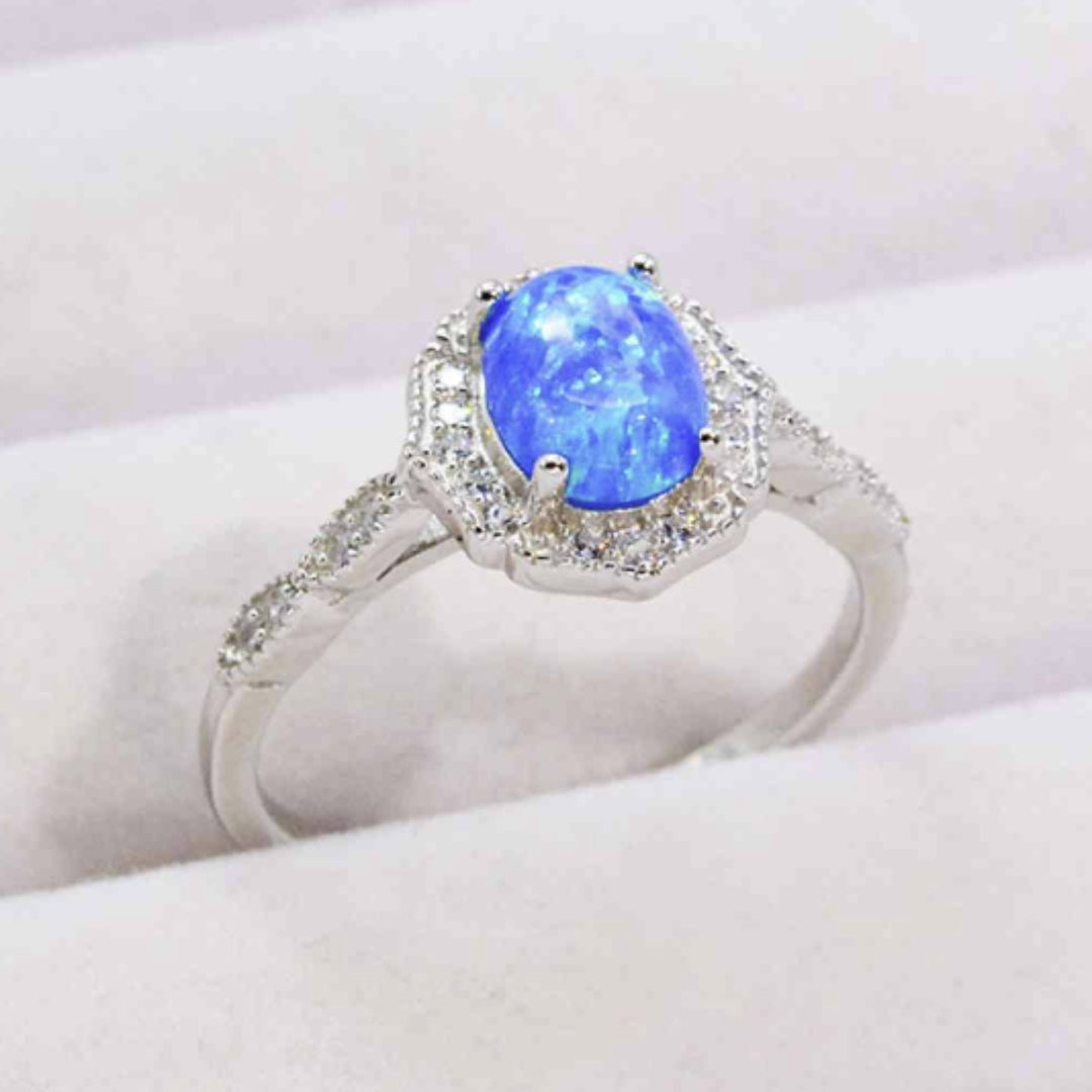 Blue Fire Opal Silver Halo Ring with Zircon Accents