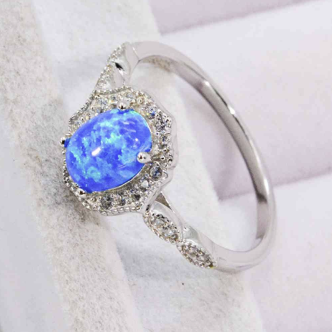 Blue Fire Opal Silver Halo Ring with Zircon Accents